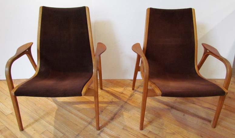 Pair of Yngve Ekstrom 'Lamino' easy chairs, designed in: Artist: Ekstrom, Yngve Title: The 'Lamino' lounge chair in brown suede and teak designed by Yngve Ekstrom, all original Date: circa 1956 Medium: molded teak, brass , and brass Dimensions: 38 x 22.5 x 