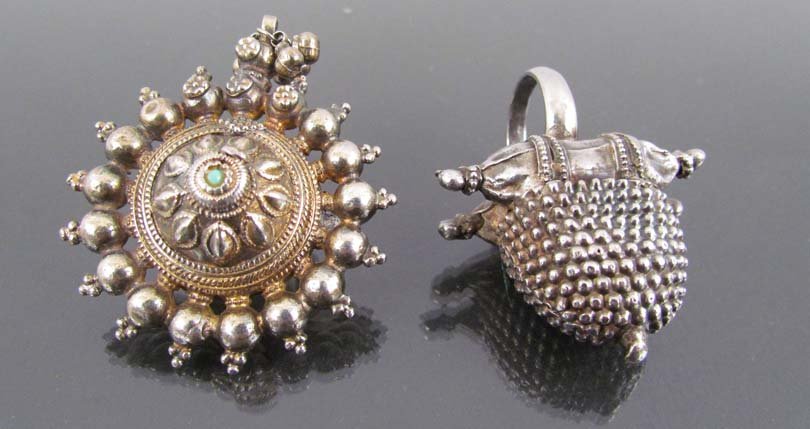 N. Indian Taviz ring & Indonesian Jhumka style ring: Title: Northern India antique silver betel nut shape amulet bead pendant made into a ring and S.E. Asian Jhumka style silver ring Date: ca mid 20th cen Medium: silver, turquoise Dimensions: sizes 8 & 