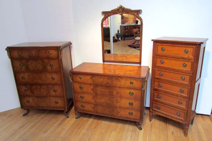 4 piece French First Empire style bedroom suite,: Acacia 4 piece French First Empire style bedroom suite, comprised of 2 tall chests, a 4 drawer dresser with separate mirror; exotic fruitwood veneer; 5 drawer dress 51 x 37.75 x 21 inches, 6 drawer li
