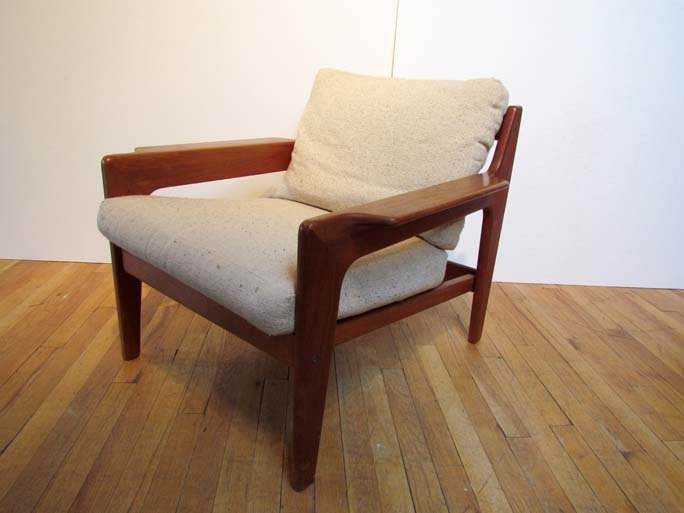 Komfort Denmark Modern Teak Arm Chair: Artist: Komfort Denmark Title: Danish Modern Teak Arm Chair with Dog Ear cuts on the arm rests Medium: teak frame Dimension: 28 x 29.5 x 31.5 inches Signature: with attached Komfort Denmark label