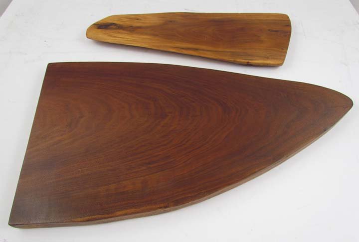 George or Mira Nakashima cutting board and display: Artist: Nakashima, attributed to George or Mira Title: cutting board and display stand Medium: walnut Dimension: longest 20 inches Description: beautifully grained organic objects Provenance: