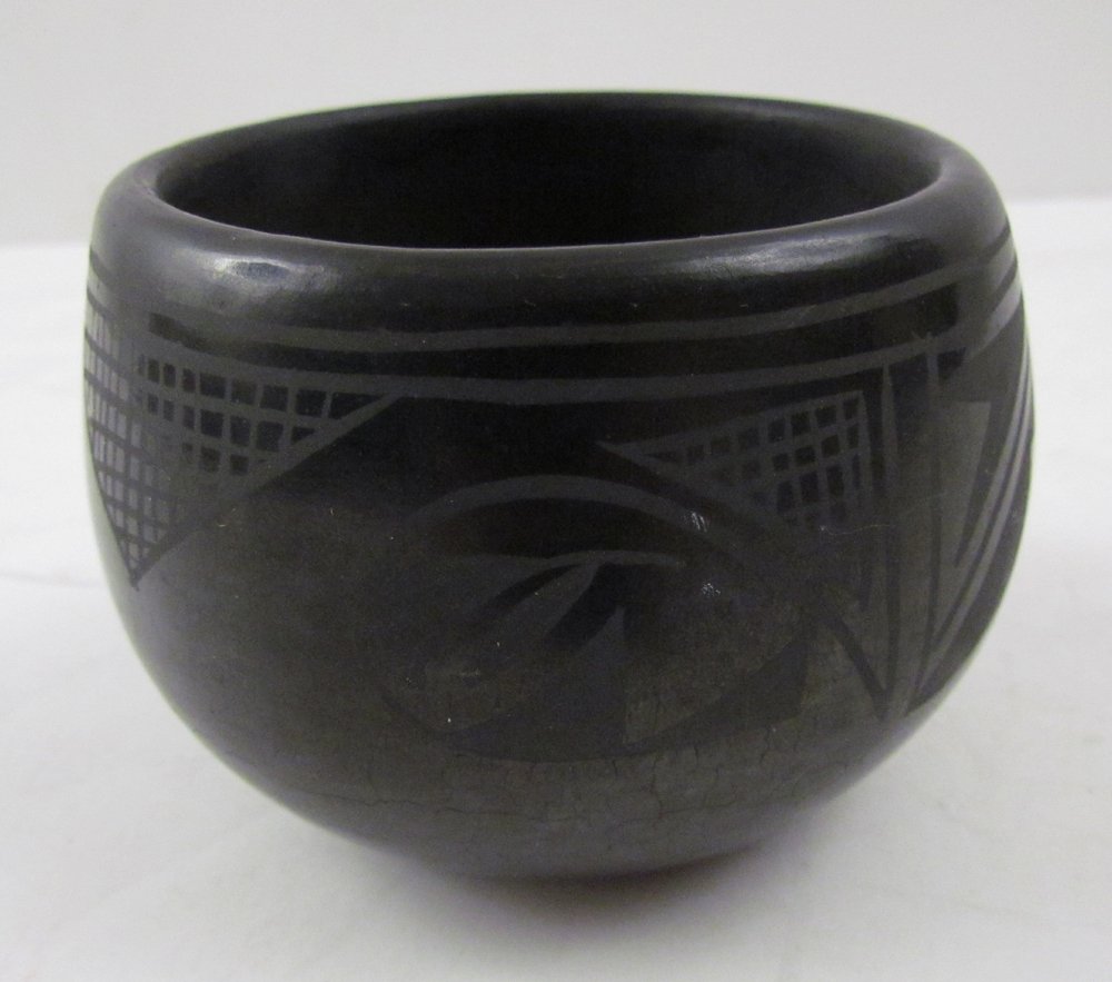 Alfred Aguilar San Ildefonso Pueblo Black Pottery Bowl: Artist: Aguilar, Alfred (New Mexico, b 1933) Title: Black Pottery Bowl by Alfred Aguilar, San Il De Fonsono Pueblo, NM Medium: ceramic Dimensions: 3 x 3 x 3 inches Signature: inscribed on underside A
