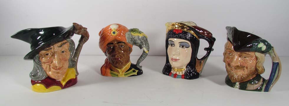 4 Royal Doulton Char Jugs: Pied Piper, Robin Hood, Elep: Artist: Stanley James Taylor, Michael Abberly for Royal Doulton Title: 3 Royal Doulton Character Jugs: Pied Piper (D6403), The Elephant Trainer (D6857), 2 Face Antony & Cleopatra(D6728)& Robin Hood (D