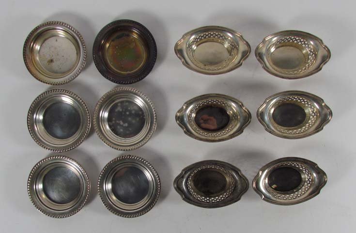 6 Sterling Salt Cellars & 6 Sterling Ash Trays: Title: 12 Sterling Objects Medium: sterling silver Dimensions: 10.2 ozt.