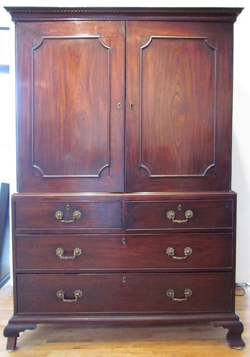 Early 19th Cent. English Georgian Linen Press: Artist: Jackson Mitchell, Inc. Title: mahogany English Georgian Linen Press with bold cast brasses in Two parts . Top fitted with 5 shallow dressing slides Date: circa late 18th or early 19th century