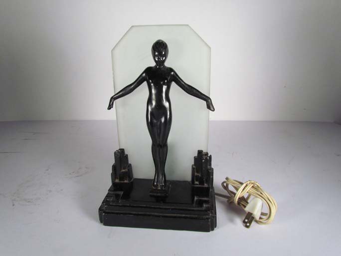 1928 Frankart Lamp , Art Deco Table lamp: Artist: Design attributed to Arthur von Frankenberg, c. 1925 Title: Frankart Art Deco silhouette nude lamp in black enamel covered metal with a frosted glass background Date: 1928 Medium: frosted glas