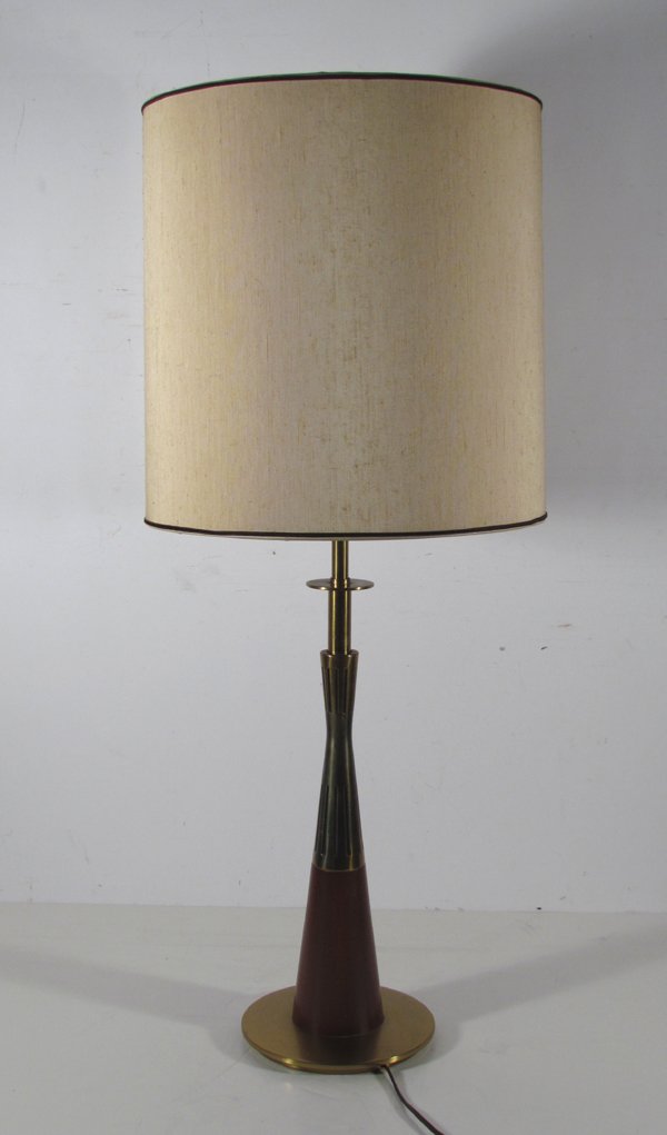 Stiffel Table lamp, Attributed to Tommi Parzinger: Artist: Parzinger, Attribute to Tommi for Stiffel Title: Stiffel Table lamp with original shade Attributed to Tommi Parzinger Medium: bronze metal and wood Dimensions: 35 x 14 1/4 x 14 1/4 Signature: 