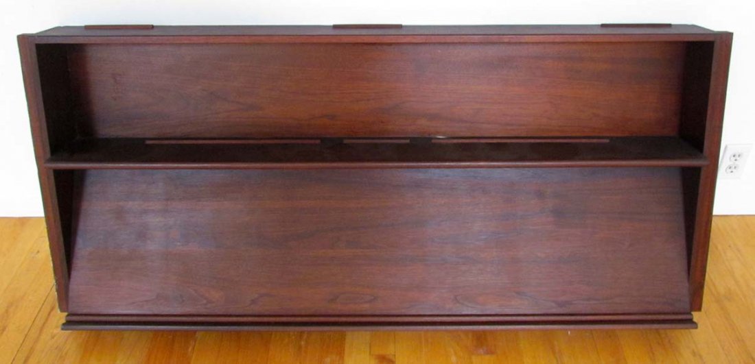 Orin Raphael custom designed shelf and magazine rack: Artist: Raphael, Orin M. (American 1918 - 1995) Title: Shelf and magazine rack Date: c. 1955 Dimensions: 25.25 x 59 x 7.25 inches Provenance: Commissioned from Oren Raphael by Gertrude Greenwald. Mrs