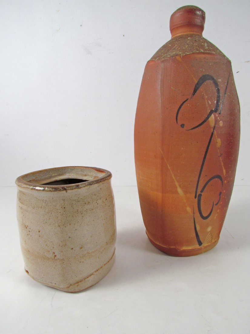 2 stoneware Vase 1 Kevin Crowe & 1 Ellenbogen & Plummer: Artist: Ellenbogen, Jon and Rebecca Plummer,& Barking Spider Pottery Kevin Crowe Title: Bottle vase and Small Chino Vase Medium: Glazed Stoneware Dimensions: 14 inches tall Signature: both with the a