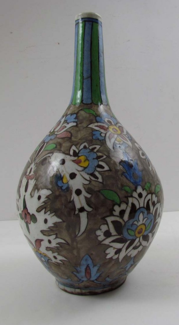 Moorish style ceramic vase w floral decoration: Medium: glazed ceramic Dimensions: 14.5 x 8 x 8 inches Provenance: The Estate of Jane Z. Haskell
