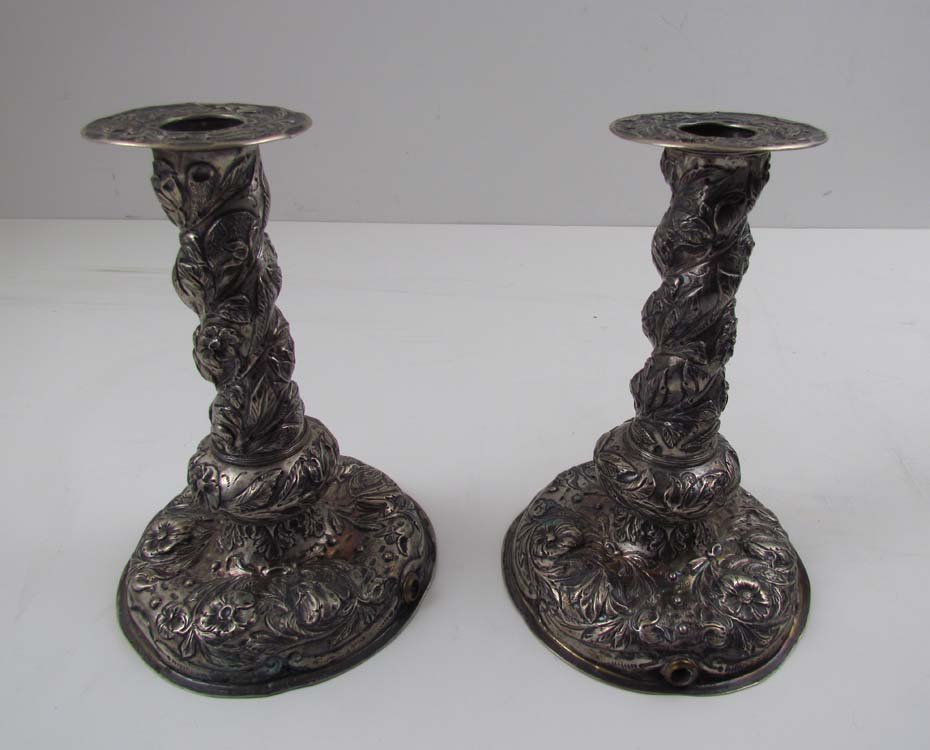 PAIR OF SILVER CANDLESTICKS, round bases with twisted: Date: Dutch, c. 1900. Medium: silver Dimensions: 7 x 5 inches Signature: stamped "AB1" and "Holland" on edge Provenance: The Estate of Jane Z. Haskell