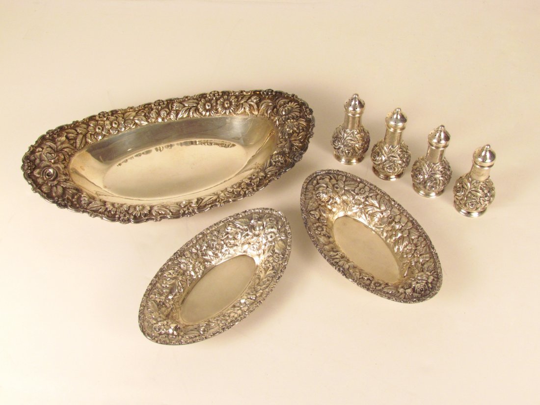 2 Stieff Sterling Salt & Peppers & 3 Serving Dishes: Artist: Stieff Title: A Set of Stieff Sterling; 2 pair Salt & Pepper shakers & 3 small Serving Dishes with repousse floral decoration Medium: sterling Dimensions: 31.22 ozt Signature: all stamped Sti