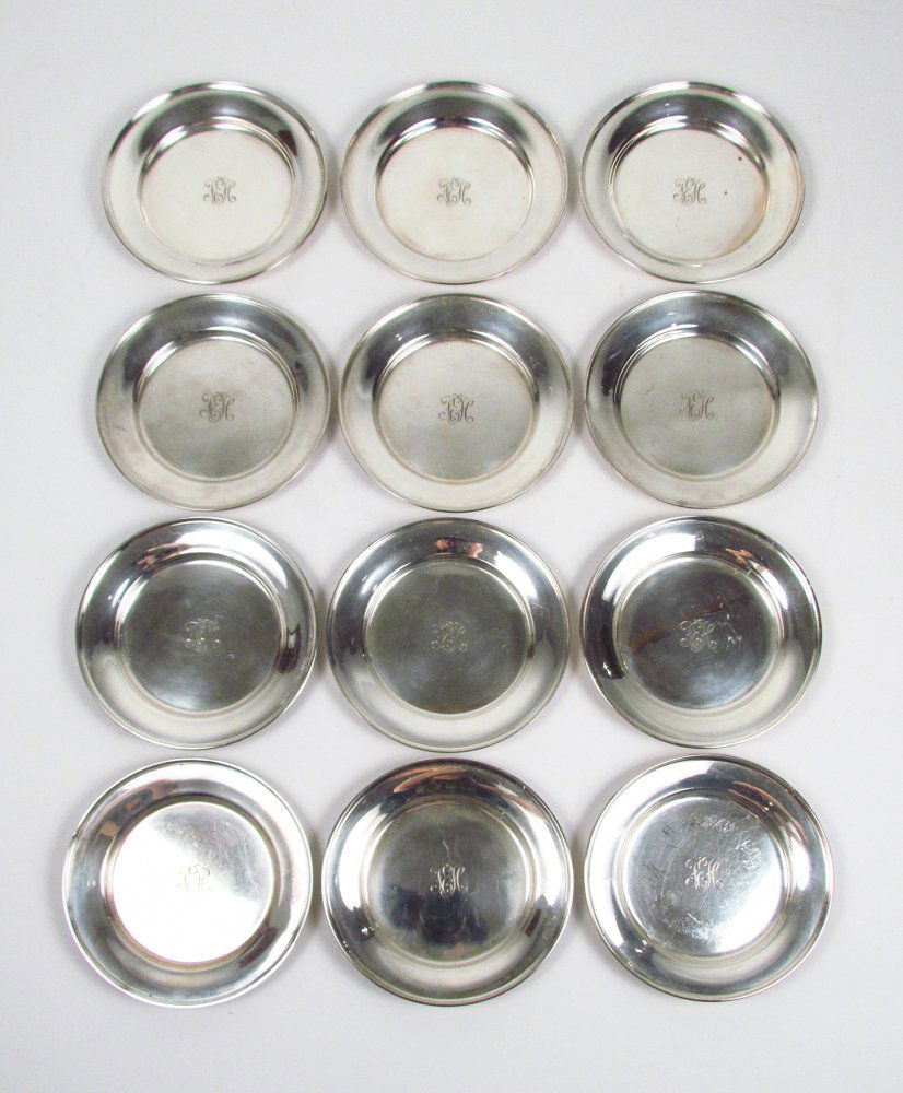 12 Sterling Coasters with monogram FEH: Title: 12 Sterling Coasters with monogram FEH Medium: sterling Dimensions: 37.6 ozt (total weight) Signature: stamped Sterling