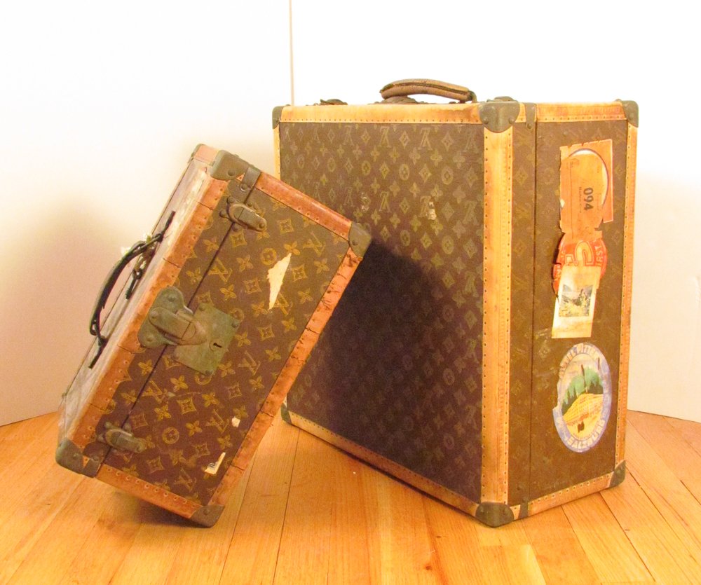 Two Vintage Louis Vuitton Suitcases: Artist: Louis Vuitton Title: Two Pieces Early 20th Century Hard Case Luggage with fitted interiors, one a travel makeup case, the other a square suitcase, with attached ship/travel labels including Cu