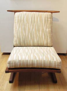 GEORGE NAKASHIMA; Conoid Lounge Chair: Artist: Nakashima, George (Japanese/American 1905 - 1990) Title: Conoid Lounge Chair Date: circa 1978 Medium: American black walnut, hickory, wool upholstery Dimensions: 34.5 w x 37 d x 34 h inches