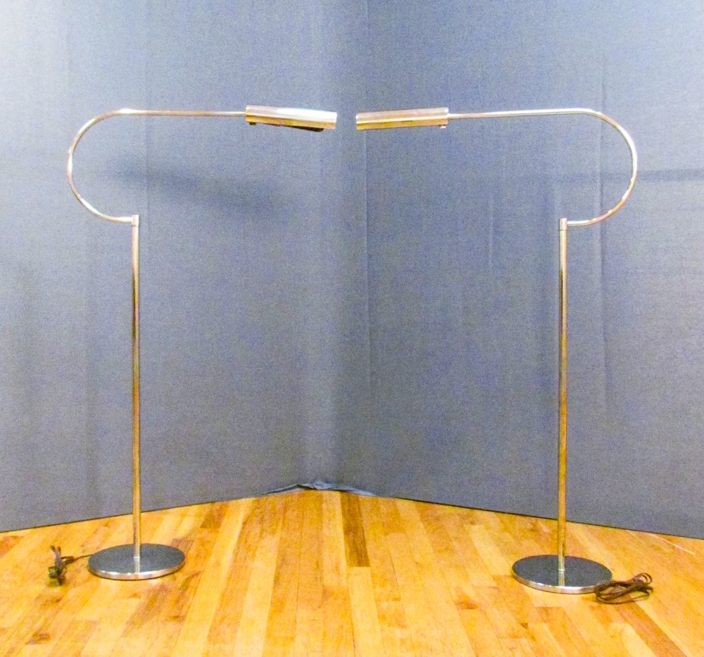 Pair of Chrome Modern Raymor lamps: Artist: Raymor Title: Pair of Chrome Modern Raymor lamps Dimensions: 43 x 28 x 9 inches Signature: old blue Raymor labels on light fitting