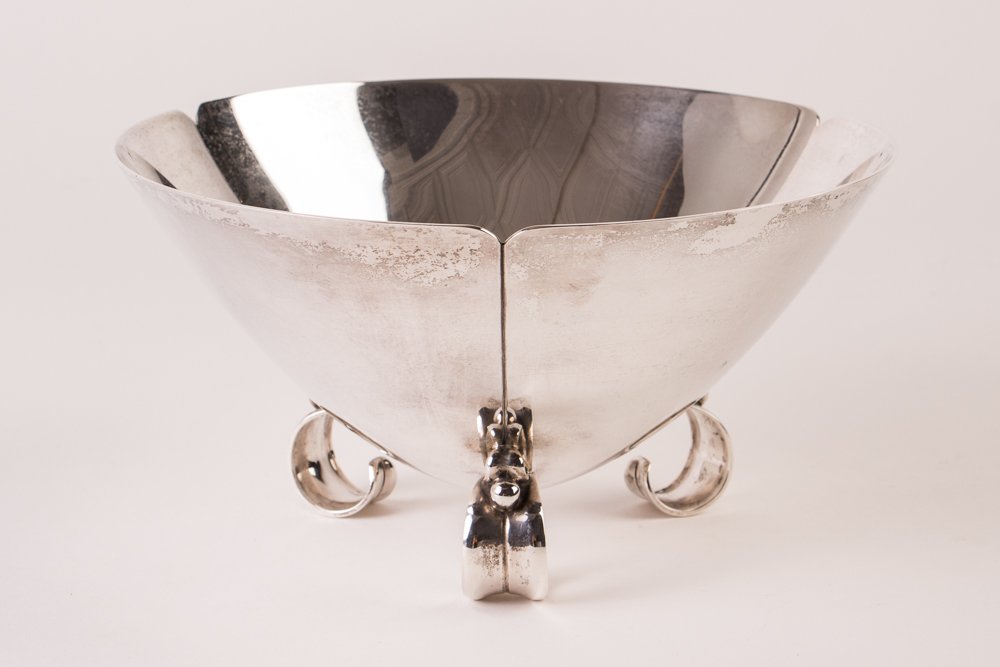 Tiffany & Co. Sterling Bowl: Artist: Tiffany Silver Title: Pattern # 23379 Tiffany & Co. Sterling Bowl reminiscent of George Jensen with Danish inspired scroll and bead foot design Date: circa 1952 Medium: sterling silver bowl Di