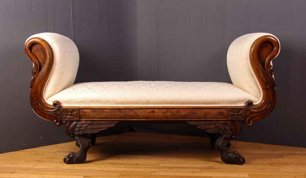 Fainting Couch w carved cabriole feet & swan neck: Title: Sleigh styled Antique Fainting Couch w carved cabriole feet & swan neck , ecru upholstery Medium: wood, upholstery Dimension: 28.25 x 53 x 22.25 inches Provenance: from the collection of Mary M