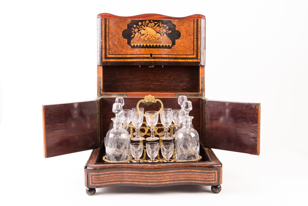 French Inlaid Serpentine Front Cellerette/Cordial: Artist: Leruth Fils, Rue de Bondy, Paris Title: Intricately Inlaid and Burled French Serpentine Front Cellerette/Cordial Service with Classical Marquetry, , with fitted brass interior complete with 4 