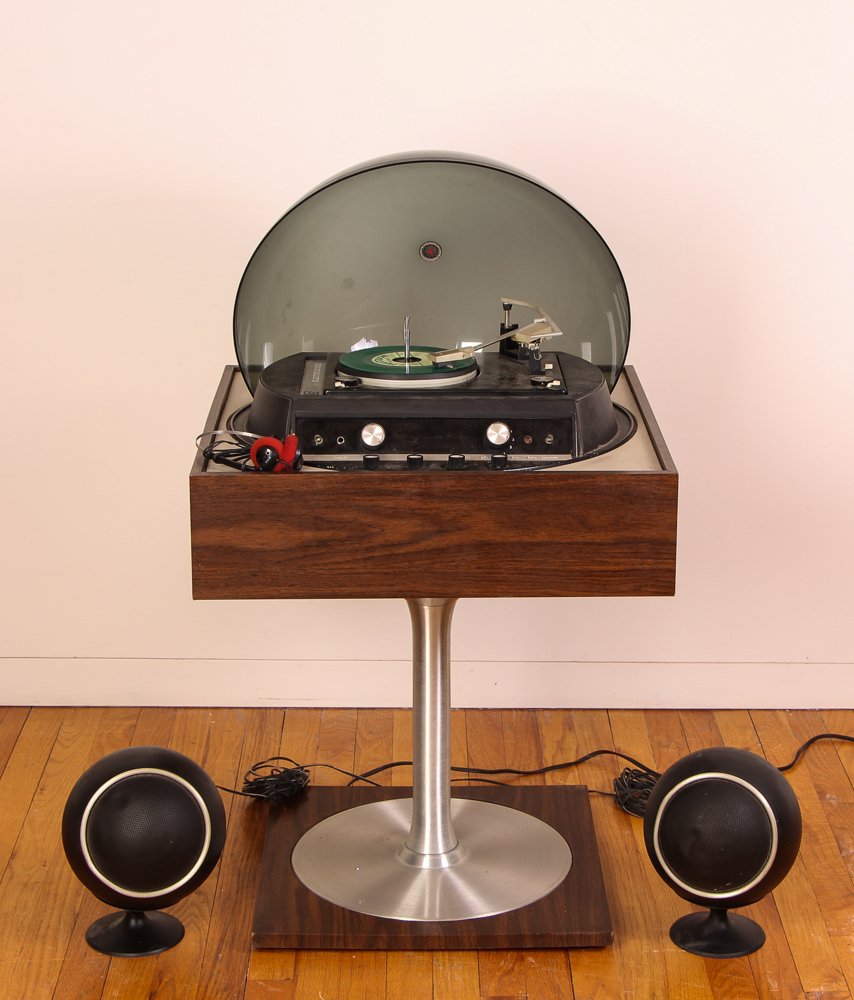 Graphic by Electrohome Turntable/Radio: Artist: Electrohome Title: Graphic Turntable/Radio, Space Age Design with ball speakers Medium: lucite, wood, chrome Dimension: 35 x 22.5 x 22.5 inches Signature: Electrohome graphic on turntable