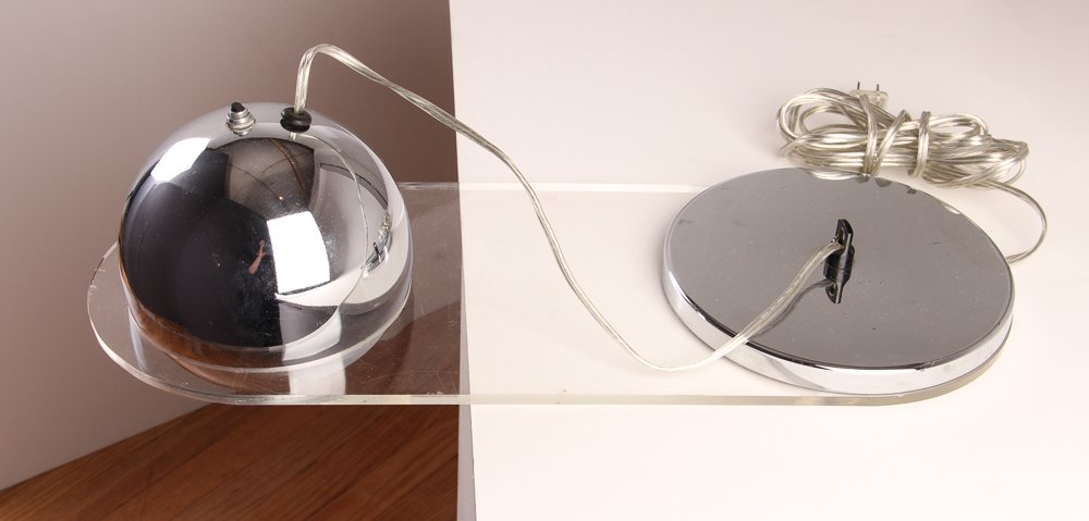 Rare Raymor Weighted Chrome/Lucite Modern Bookshelf: Artist: Raymor Title: Weighted Chrome/Lucite Modern Bookshelf Light (lucite end suspends chrome "eyeball", weighted chrome counter balance on other side, sometimes used as a bookshelf or piano light)