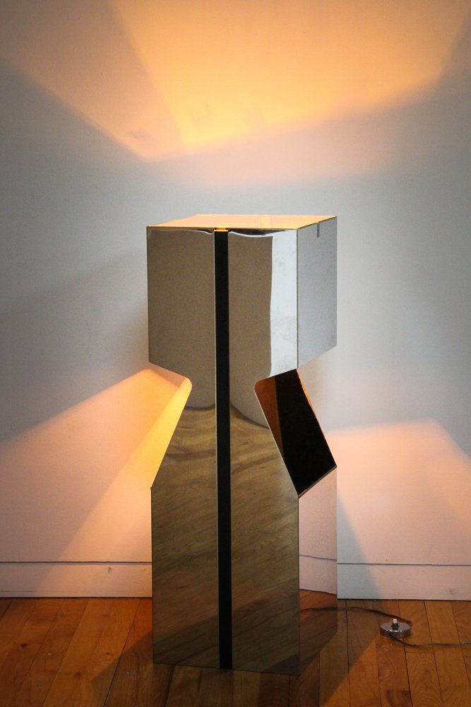 Neil Small for Kovacs Pedestal Lamp/Magazine Holder: Artist: Small, Neil for Kovacs Lighting Title: Pedestal Lamp/Magazine Holder Medium: chrome, glass Dimension: 34.5 x 12 x 12 inches Signature: no labels