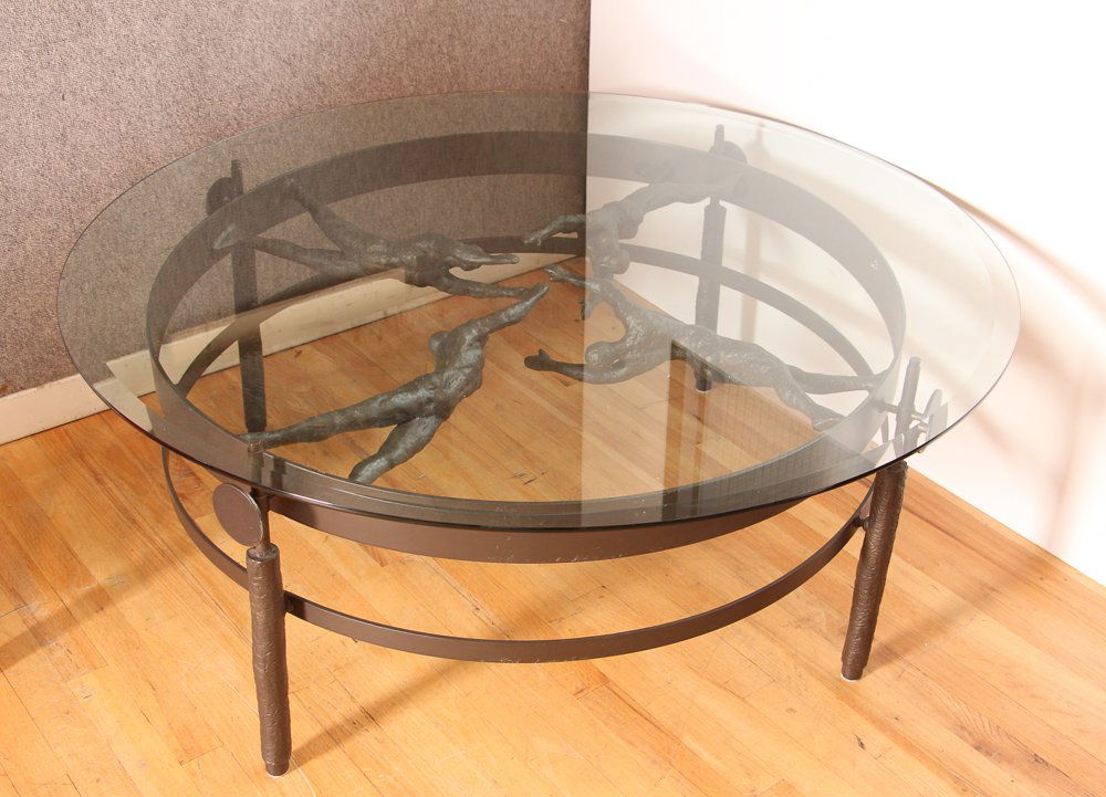Ernest Trova, attrib. "Falling Men Coffee Table": Artist: Trova, Attributed to Ernest Tito (American 1927 - 2009) Title: Falling Men Coffee Table Medium: cast and welded bronze table with beveled circular plate glass top Dimension: 19 x 48 x 48 inche