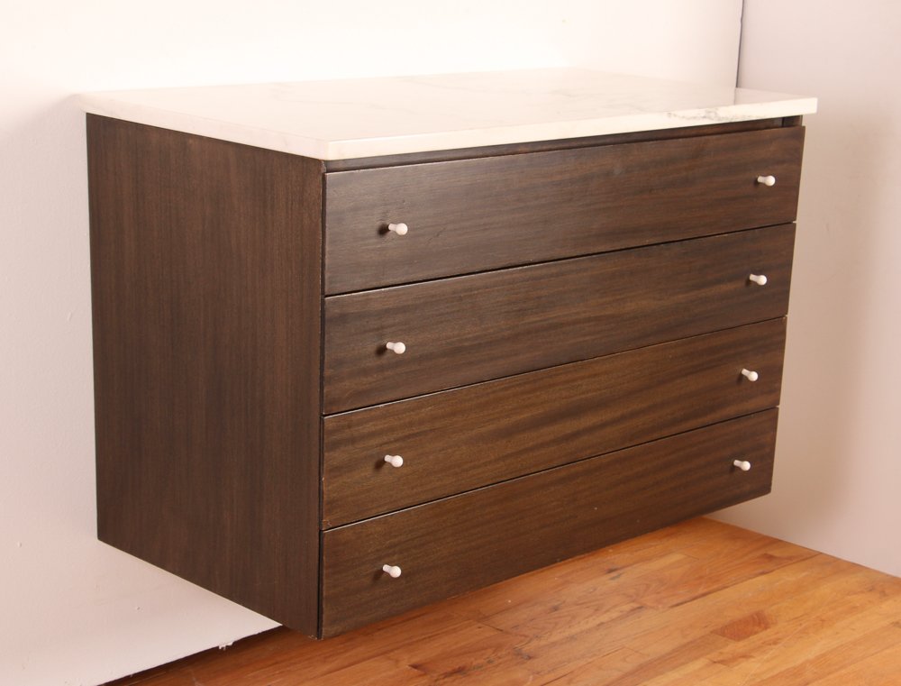 Wall Mounted Paul McCobb for Calvin Cabinet: Artist: McCobb, Paul (1917 - 1969) for Calvin Title: Wall Mounted Cabinet with 4 Drawers and Marble Top Medium: stained walnut with marble Dimensions: 37 x 19 x 24 inches Signature: Calvin Label in dr