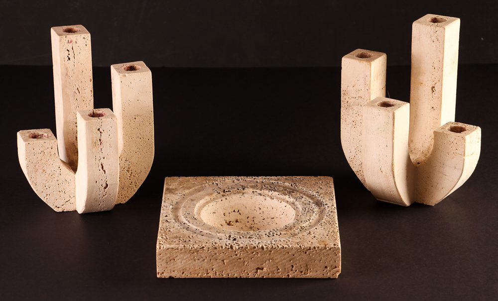 Pair Raymor travertine candlesticks and ashtray: Artist Raymor Title Pair of Cream Travertine Candlesticks with travertine ashtray Medium travertine Dimensions 8 x 6 x 6 inches Signature no markings on candlesticks, Raymor label on