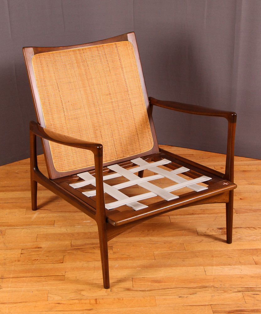 Selig Cane-Back Armchair: Artist Selig (Made in Denmark) Title Mid Century Danish Selig Cane-Back Armchair Date circa mid 20th century Medium teak, cane Dimensions 31 x 28.75 x 31 inches Signature S