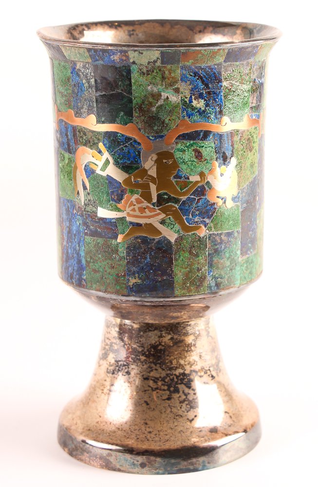LOS CASTILLO Pluma Azteca Taxco Chalice: Title: Aztec Chalice Medium: Los Castillo inlaid work from Taxco, inlay of silver, copper, brass, turquoise, Dimensions: 8.8 inches tall Signature: with Castillo Taxco stamp on underside with Plaeado 