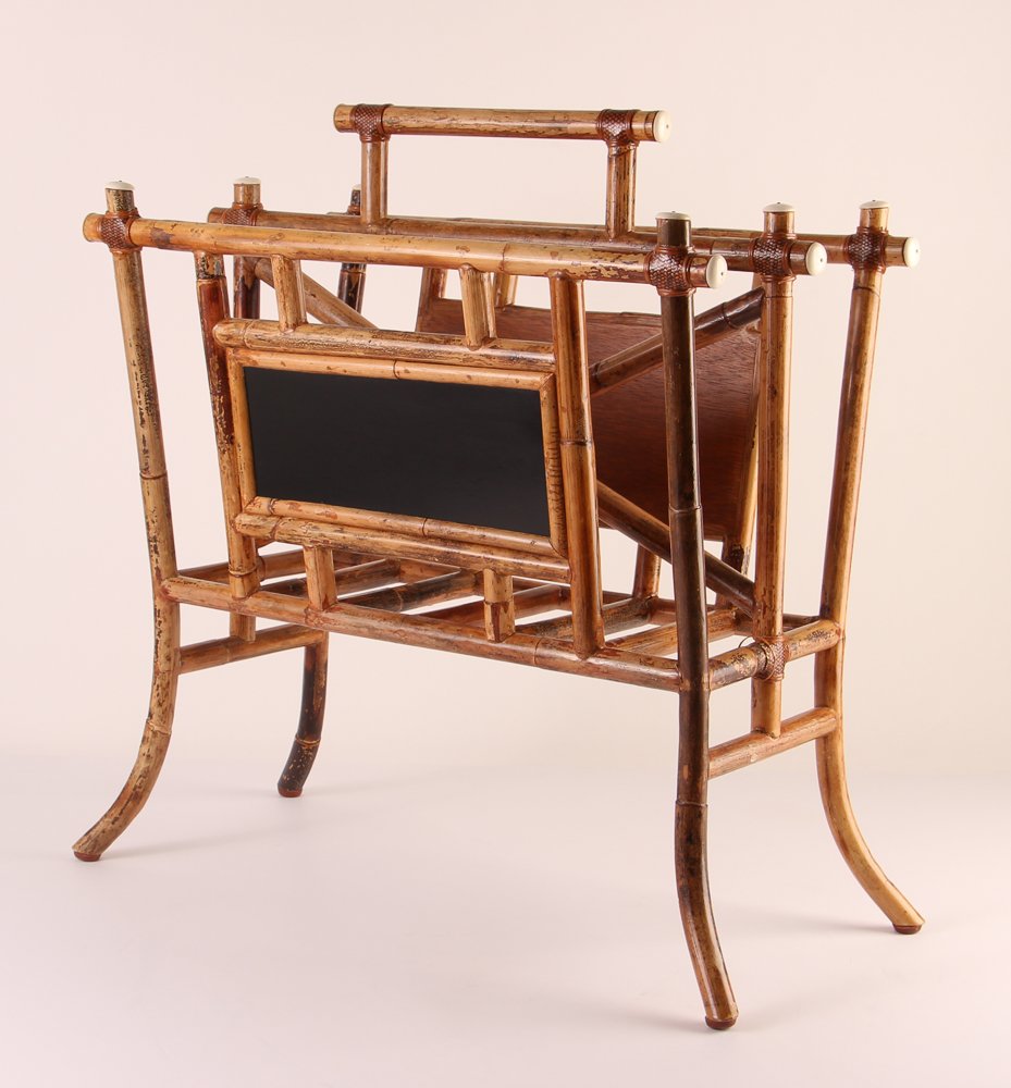 John McGuire Magazine Rack: John McGuire original design Magazine Rack, late 20th Century bamboo, rawhide, and bone 24 x 23 x 13 inches Provenance: The Estate of Barbara Rackoff, Pittsburgh, Pa.
