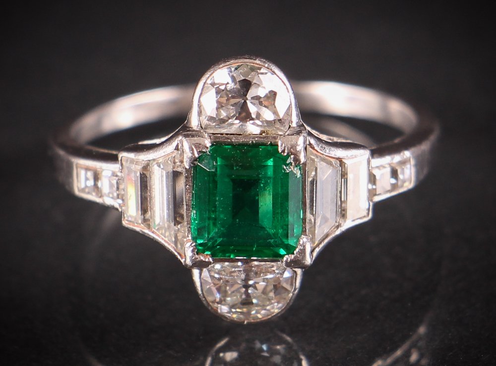 Art Deco Emerald and Diamond Ring: Title:Art Deco Emerald and Diamond Ring Medium:emerald, diamonds, (probable platinum) Dimensions:finger size 8, 2.8 dwt Provenance:The James D. Hague Family Estate. Hague was the founder and owner of