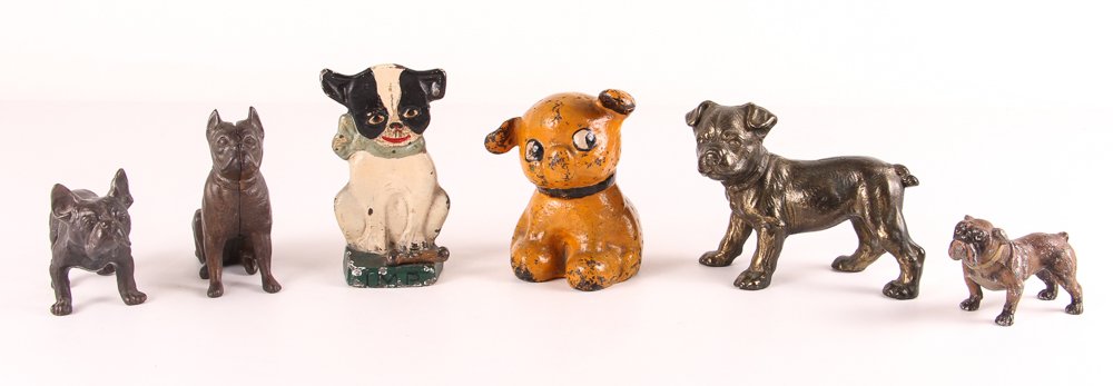 Six Dog Formed Antique Cast Metal Weights & Doorstop: Artist:Grace Radnor for Hubley Title:Six Dog Themed Antique Cast Metal Weights, including: Cast Dog Imp with Bone Doorstop by Grace Radnor for Hubley & Bulldog Still Bank Date:c. early 20th century Me
