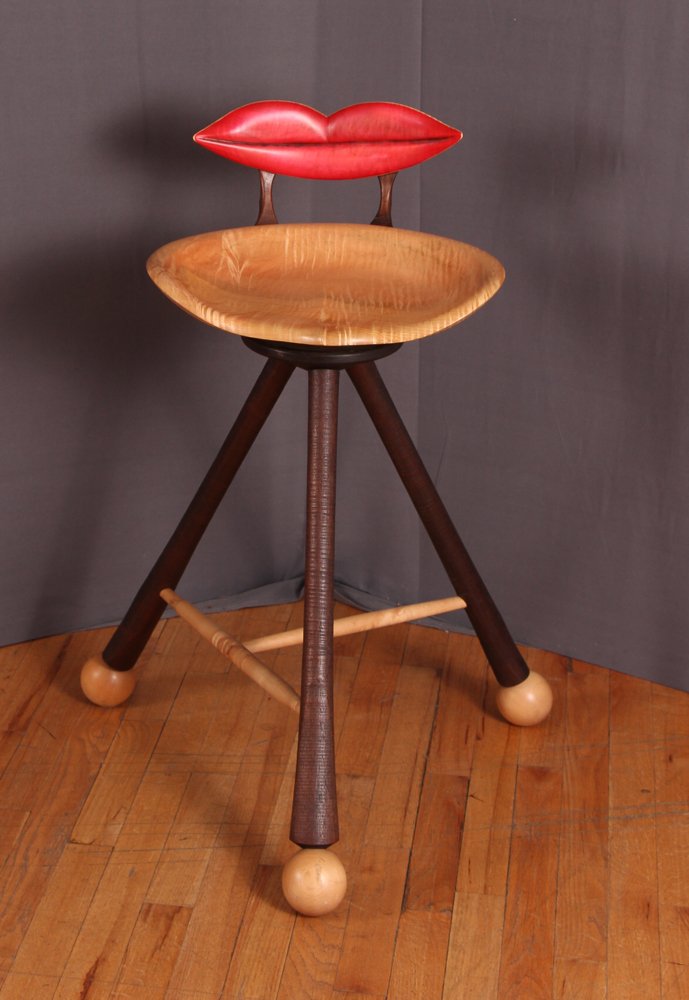 JoHannes Michelsen "Lips" unique barstool: Michelsen, JoHannes (Contemporary Woodworker known for his wooden hats), "Lips Barstool" , various native woods, branded with the maker's name under the seat, 32 inches tall, Provenance: The Garden Ca
