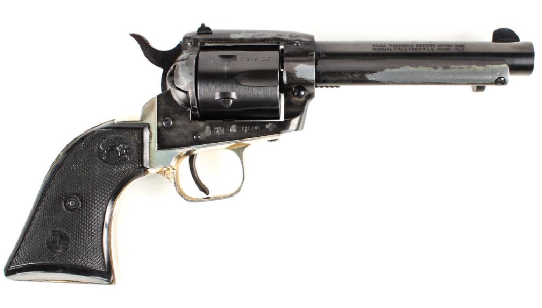 FIE TANFOGLIO E-15 .22LR SINGLE ACTION REVOLVER: FIE TANFOGLIO E-15 .22LR SINGLE ACTION REVOLVER FIE Tanfoglio .22LR single action revolver. Made in Italy Caliber / Gauge: .22LR Barrel Length: 4.5 INCH Serial Number: TC07083 Condition: Some wear to 