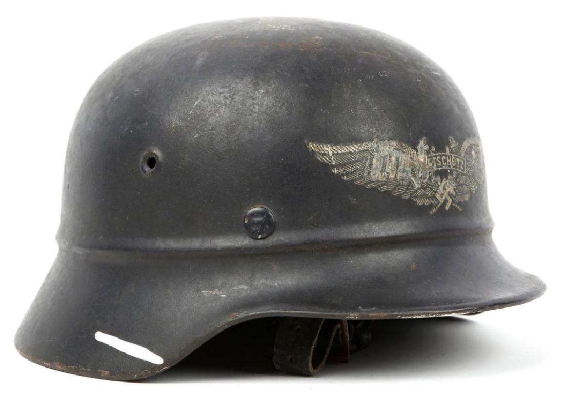 WWII GERMAN LUFTSCHUTZ HELMET: WWII GERMAN LUFTSCHUTZ HELMET Size: 56 Provenance: This collection came from Howard Monroe Basiden who was Lt. Col. in the XV Corps of the U.S. Army. He served on the staff of Lt. Gen. Wade H. Haislip