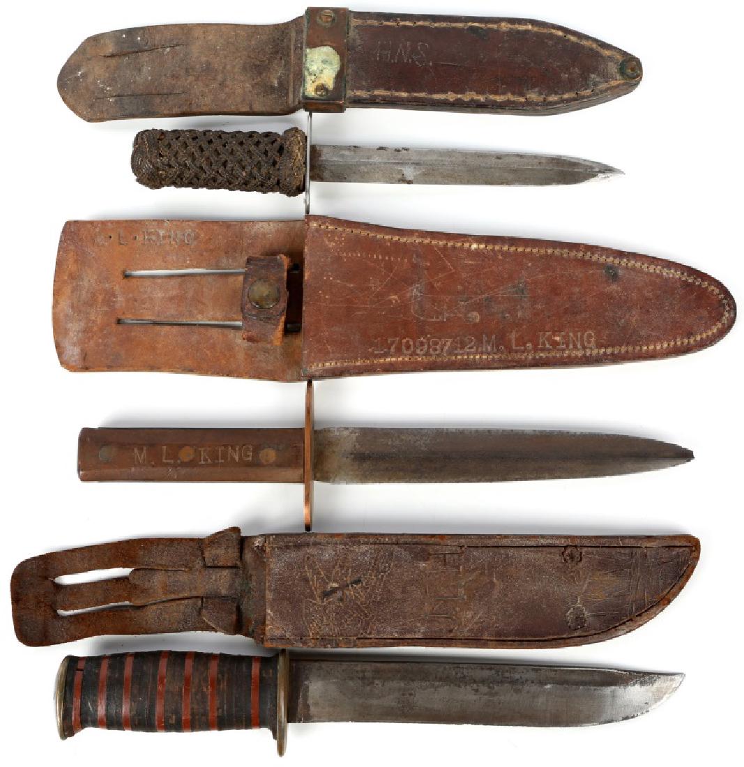 US FIGHTING KNIFE WITH SCABBARD LOT OF 3: US FIGHTING KNIFE WITH SCABBARD LOT OF 3 Scabbards embossed with JLH, HNS, and M.L. King 17098712. Blade Length: 6.25" Overall Length: 10"