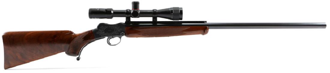 CUSTOM W. W. GREENER MARTINI ACTION RIFLE: CUSTOM W. W. GREENER MARTINI ACTION RIFLE McGowen Premium barrel. Walnut stock with cheek rest. Scroll engraved by George Sherwood. Simmons 3-9x32 scope. Caliber / Gauge: 6.35x47mm Barrel Length: 28"