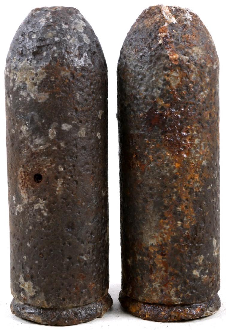 CIVIL WAR US PARROTT SHELL LOT OF 2: CIVIL WAR US PARROTT SHELL LOT OF 2 Parrott shell diameter 2.86", length 8.5" Size: 8.5" Provenance: Lifelong Civil War Relic Collection of Dr. W Cullen Sherwood - Geologist, Historian, and Civil War 