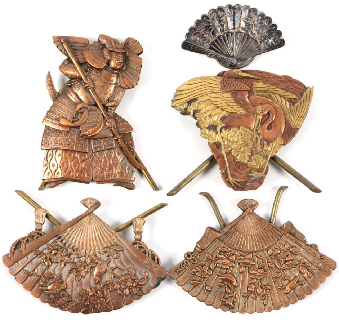 JAPANESE RELIEF PIECES: JAPANESE RELIEF PIECES Four standing relief pieces and one silver plated pin. Size: 2x3"