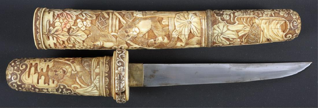 JAPANESE CARVED BONE TANTO: JAPANESE CARVED BONE TANTO Blade Length: 5.5" Overall Length: 9.75"