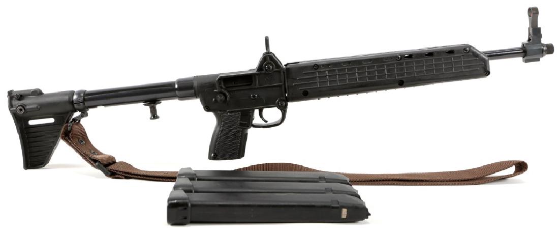 KEL TEC SUB2000 9mm FOLDING CARBINE: KEL TEC SUB2000 9mm FOLDING CARBINE Three 33 round Glock magazines. Improved front sight. 12x28 tpi threaded barrel. Caliber / Gauge: 9mm Barrel Length: 16" Serial Number: EBE35