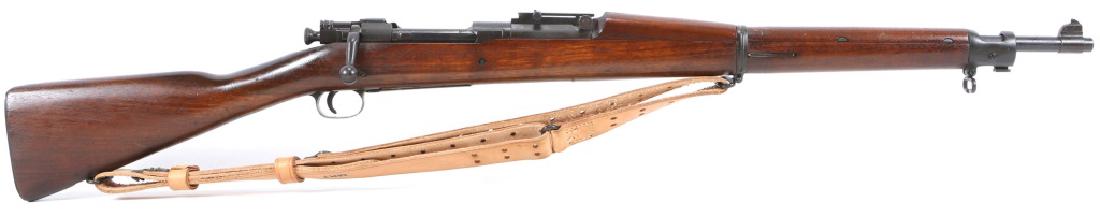 WWII US REMINGTON MODEL 1903 RIFLE: WWII US REMINGTON MODEL 1903 RIFLE RA 5-42 marked barrel with flaming bomb mark. Boxed FJA mark on stock with faint crossed cannon mark.. OG mark on stock. Leather shooting sling. Caliber / Gauge: .30