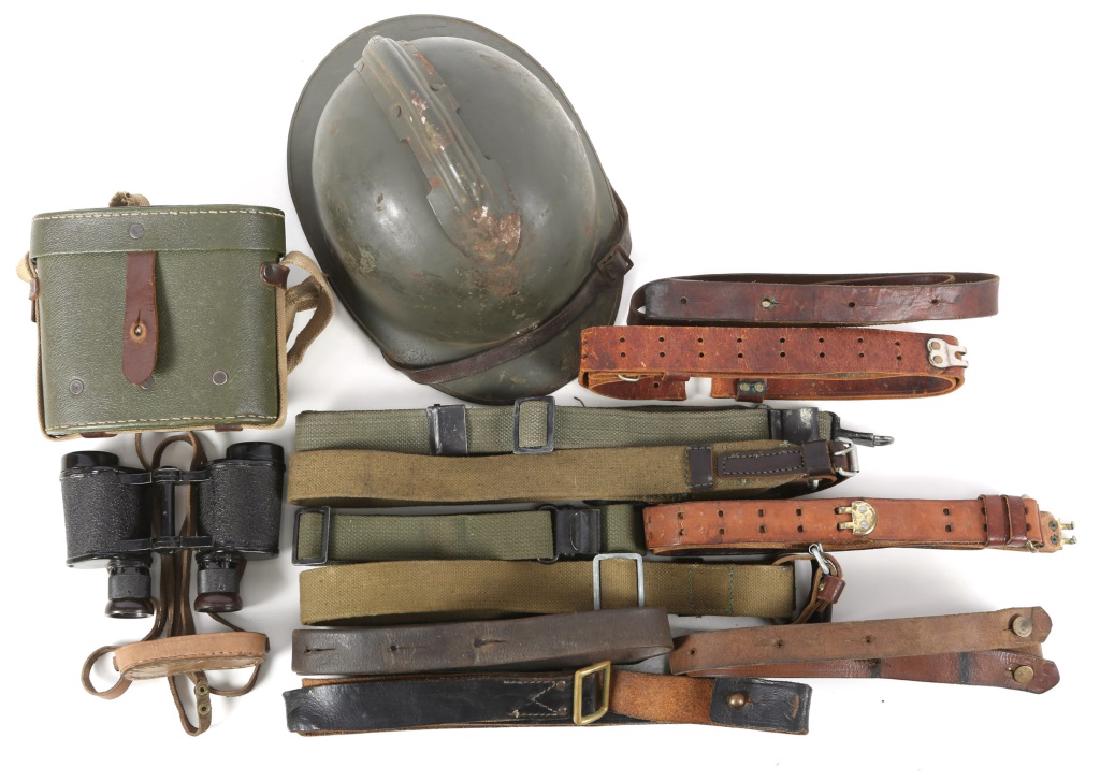 SOVIET FEILD GLASSES, FRENCH HELMET, SLINGS: SOVIET FEILD GLASSES, FRENCH HELMET, SLINGS 1952 marked Soviet field glasses are in a carry case and feature a ranging ridicule. Mixed group of leather and cloth rifle slings. French Adrian style helm