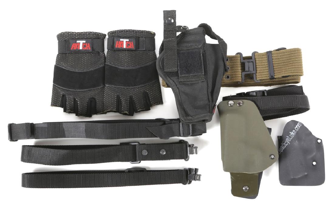 LOT OF RIFLE SLINGS AND PISTOL HOLSTERS: LOT OF RIFLE SLINGS AND PISTOL HOLSTERS Two rifle slings, three pistol holsters with belt, and one pair of gloves.