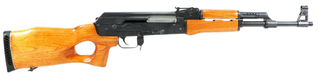 NORINCO MODEL MAK-90 SPORTER RIFLE 7.62MM: NORINCO MODEL MAK-90 SPORTER RIFLE 7.62MM C.J.A. SFLB M1 engraved in left side above trigger. Model: MAK-90 SPORTER Caliber / Gauge: 7.62x39mm Barrel Length: 16" Serial Number: 89993