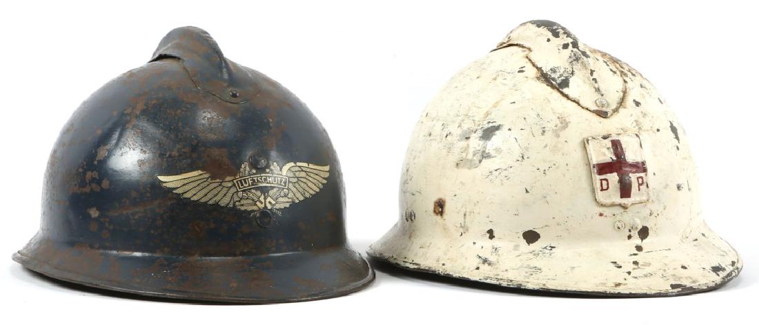WWII FRENCH M26 ADRIAN HELMET LOT OF 2: WWII FRENCH M26 ADRIAN HELMET LOT OF 2 French M26 Adrian helmet lot of 2. Red Cross defense passive, M26 Luftschutz.