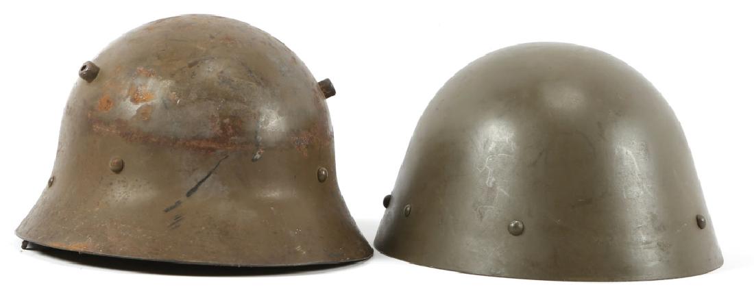 WWII CZECH VZ30 AND VZ34 COMBAT HELMET LOT OF 2: WWII CZECH VZ30 AND VZ34 COMBAT HELMET LOT OF 2 Complete with liners and chinstraps.