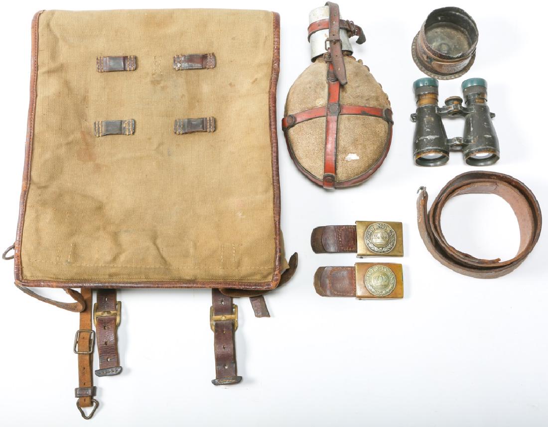 WWI GERMAN ARMY FIELD GEAR MIXED LOT OF 6: WWI GERMAN ARMY FIELD GEAR MIXED LOT OF 6 WWI knapsack. Medic canteen. WWI German officer binoculars. Prussian belt and buckle. Prussian buckle. Trench art shell.